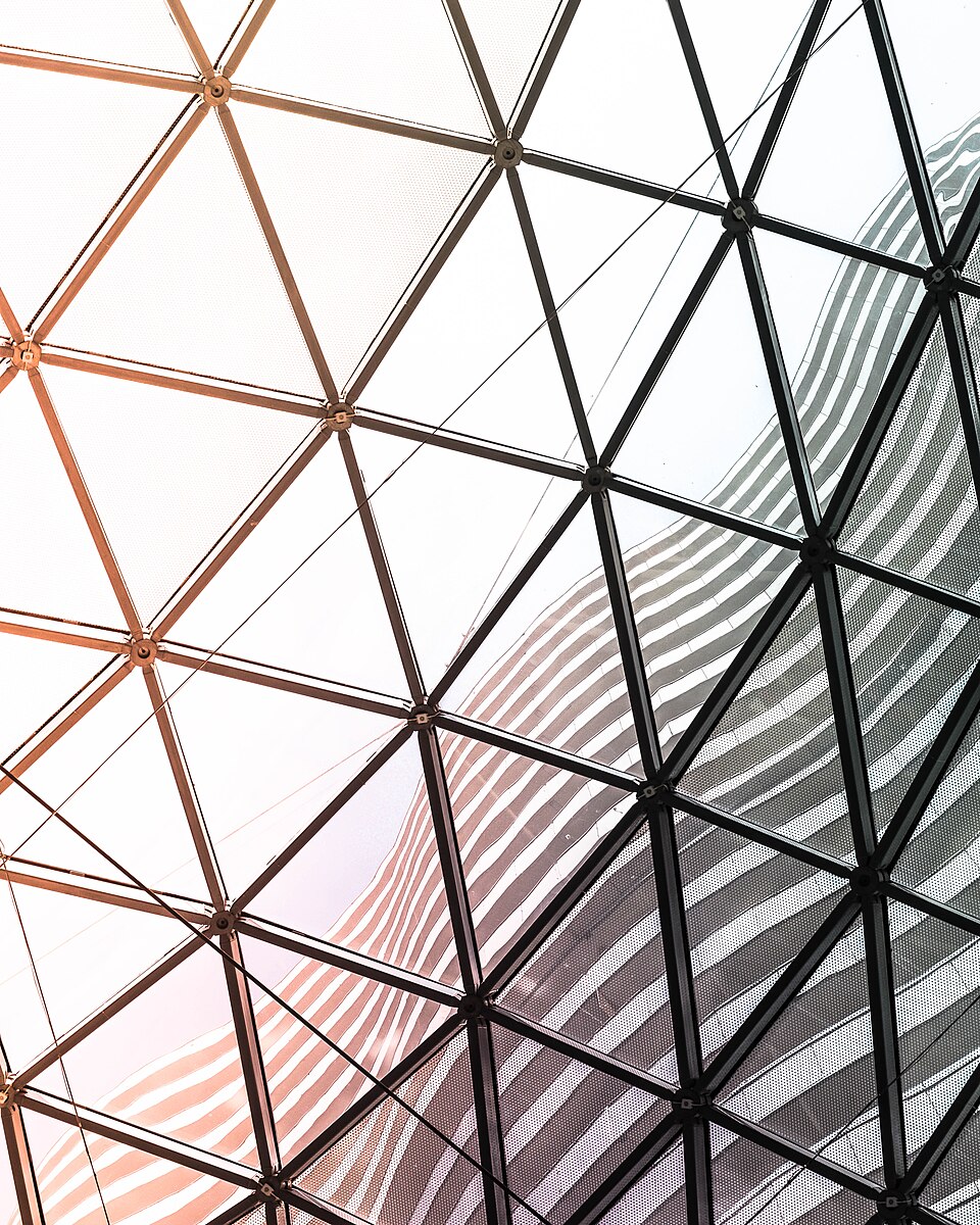 Triangular beams forming a geometric glass dome